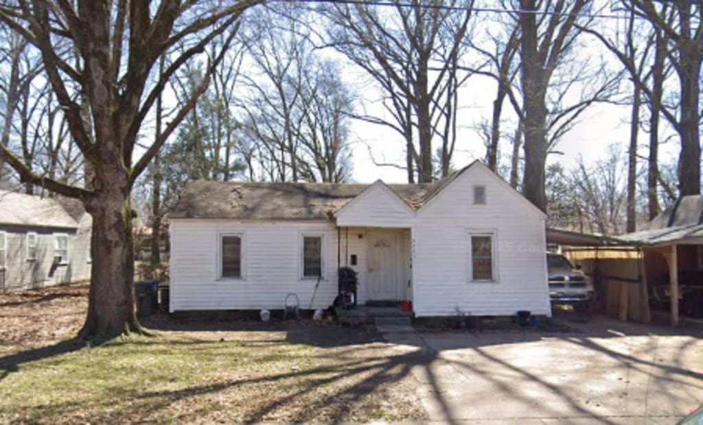 4201 Truman Ave, Memphis, TN 38108 - bungalow-style house with driveway and a carport
