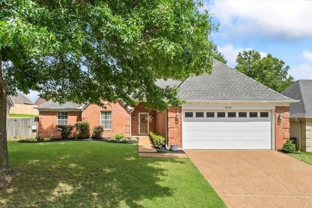 3080 Long Bridge Ln, Lakeland, TN 38002 - view of front of property with brick siding, a garage, a shingled roof, and driveway