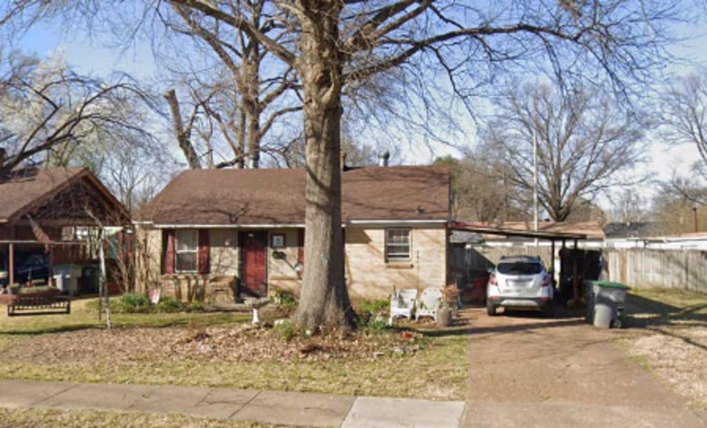 4626 Owen Rd, Memphis, TN 38122 - ranch-style house with driveway and an attached carport