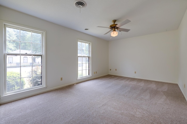 5662 Chapman Ave, Memphis, TN 38119 - spare room featuring light colored carpet and a ceiling fan