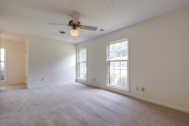 5662 Chapman Ave, Memphis, TN 38119 - unfurnished room featuring plenty of natural light, light colored carpet, and a ceiling fan