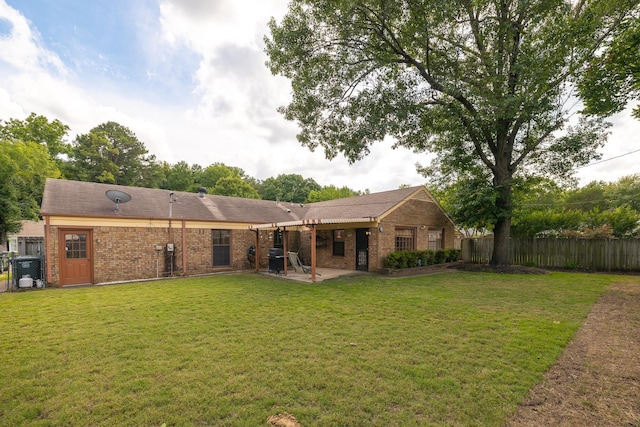 5662 Chapman Ave, Memphis, TN 38119 - back of property with brick siding and a patio area