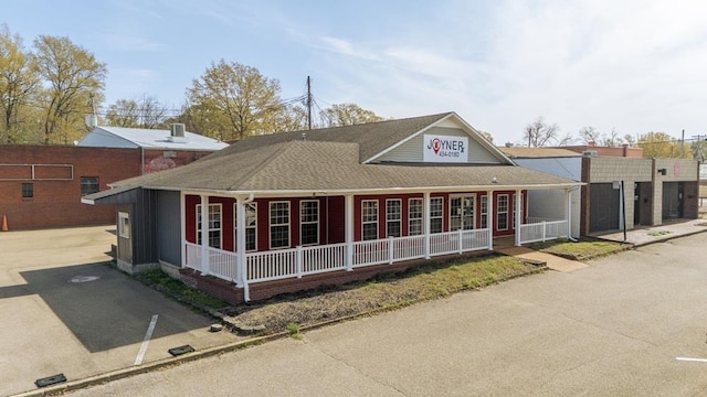 119 N 4th St, Selmer, TN 38375 - view of front of property with a porch