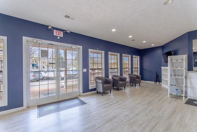 119 N 4th St, Selmer, TN 38375 - lobby with a textured ceiling, recessed lighting, and a surveillance system