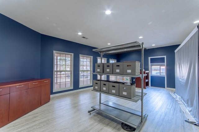119 N 4th St, Selmer, TN 38375 - exercise area with light wood-style floors and recessed lighting