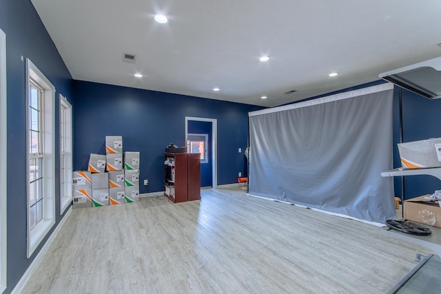 119 N 4th St, Selmer, TN 38375 - game room with wood finished floors, plenty of natural light, and recessed lighting