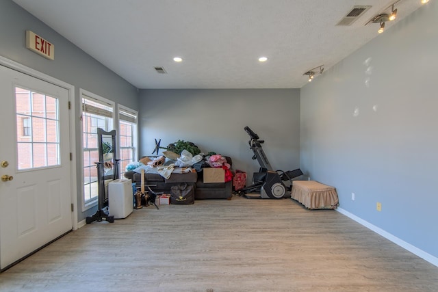 119 N 4th St, Selmer, TN 38375 - entryway with wood finished floors, recessed lighting, and track lighting