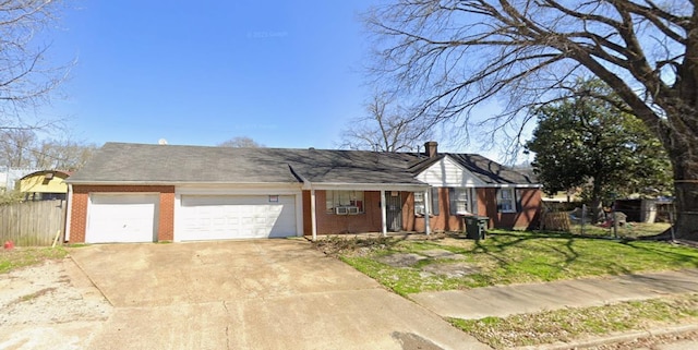 3660 N Lloyd Cir, Memphis, TN 38108 - single story home featuring an attached garage, brick siding, driveway, and covered porch