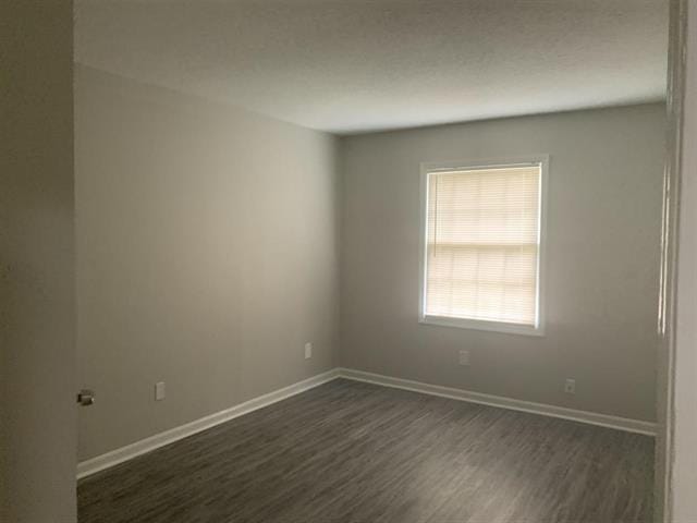 3793 Station Way Unit 3793, Memphis, TN 38115 - spare room with dark wood-style flooring and baseboards