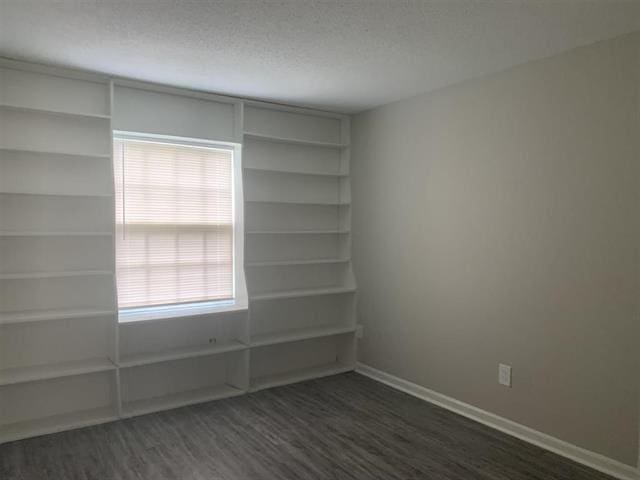3793 Station Way Unit 3793, Memphis, TN 38115 - spare room featuring dark wood finished floors and a textured ceiling