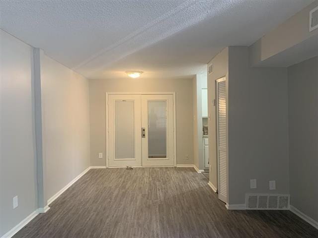 3793 Station Way Unit 3793, Memphis, TN 38115 - unfurnished room featuring dark wood-style floors and a textured ceiling