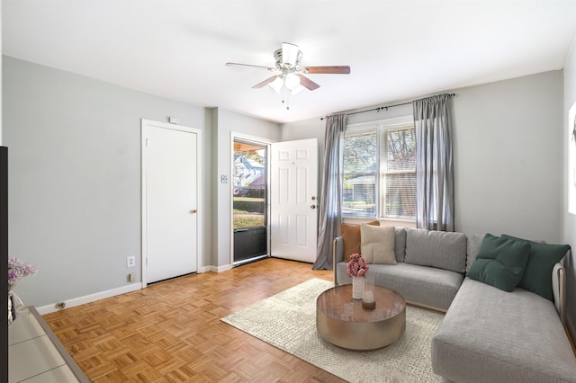 2092 Harbert Ave, Memphis, TN 38104 - living area featuring ceiling fan and baseboards