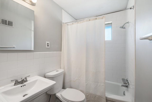 2092 Harbert Ave, Memphis, TN 38104 - full bath with tile walls and shower / bathtub combination with curtain