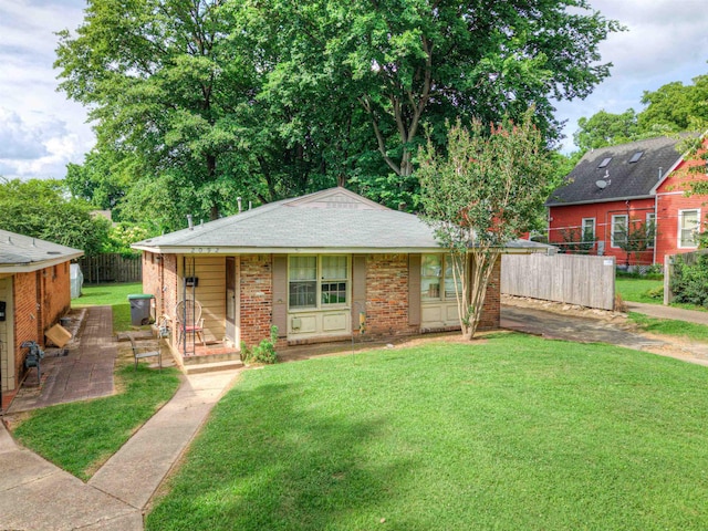 2092 Harbert Ave, Memphis, TN 38104 - bungalow with covered porch and brick siding