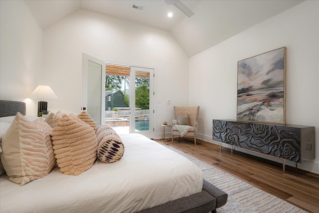 2486 E Allelon Rd E, Germantown, TN 38138 - bedroom featuring access to outside, wood finished floors, and high vaulted ceiling