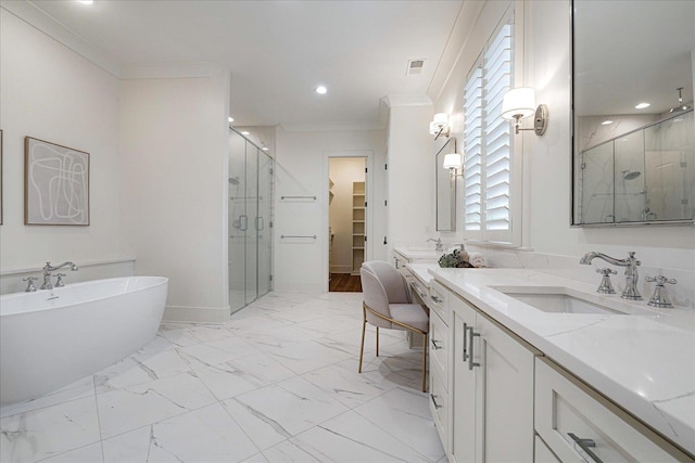 2486 E Allelon Rd E, Germantown, TN 38138 - bathroom with a shower stall, double vanity, ornamental molding, a freestanding tub, and a spacious closet