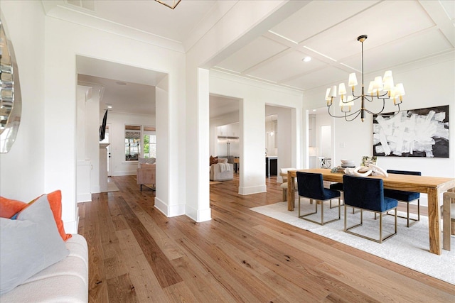 2486 E Allelon Rd E, Germantown, TN 38138 - dining space featuring light wood-type flooring, a chandelier, ornamental molding, coffered ceiling, and recessed lighting