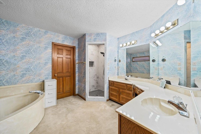 3889 Oak Trace Cv, Bartlett, TN 38135 - full bathroom with wallpapered walls, vanity, a stall shower, a garden tub, and a textured ceiling