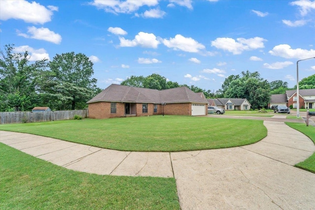 3889 Oak Trace Cv, Bartlett, TN 38135 - ranch-style house featuring an attached garage, concrete driveway, and brick siding