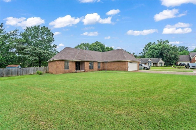 3889 Oak Trace Cv, Bartlett, TN 38135 - ranch-style home featuring driveway, an attached garage, and brick siding
