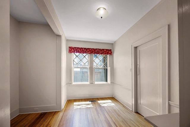 2067 Hallwood Dr, Memphis, TN 38107 - spare room featuring wood finished floors and baseboards