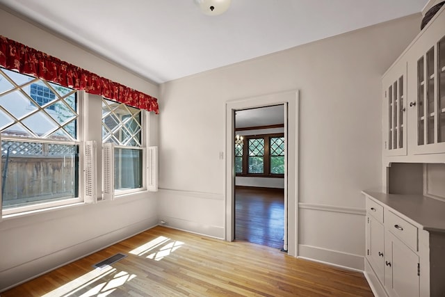 2067 Hallwood Dr, Memphis, TN 38107 - unfurnished dining area featuring light wood finished floors