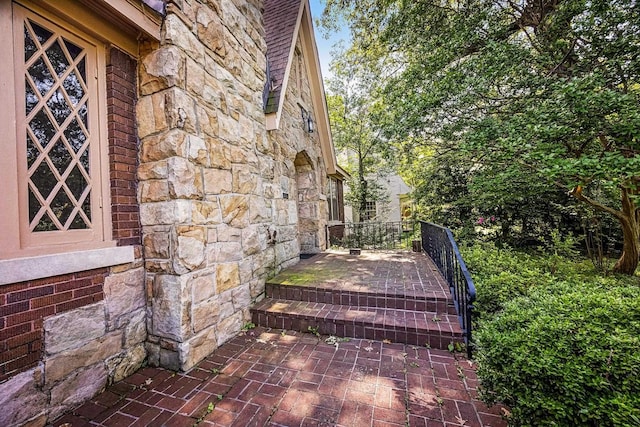 2067 Hallwood Dr, Memphis, TN 38107 - doorway to property with stone siding