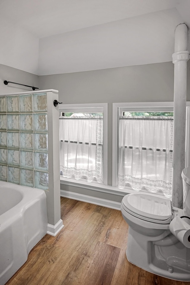 2067 Hallwood Dr, Memphis, TN 38107 - full bath featuring wood finished floors and shower / bathtub combination