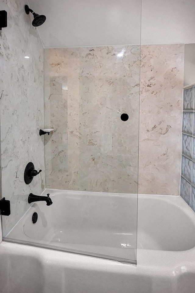2067 Hallwood Dr, Memphis, TN 38107 - full bathroom featuring washtub / shower combination