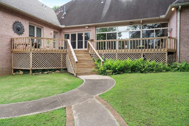 6500 State Line Rd, Tn, TN 38141 - back of property featuring brick siding, a shingled roof, a deck, a lawn, and stairway