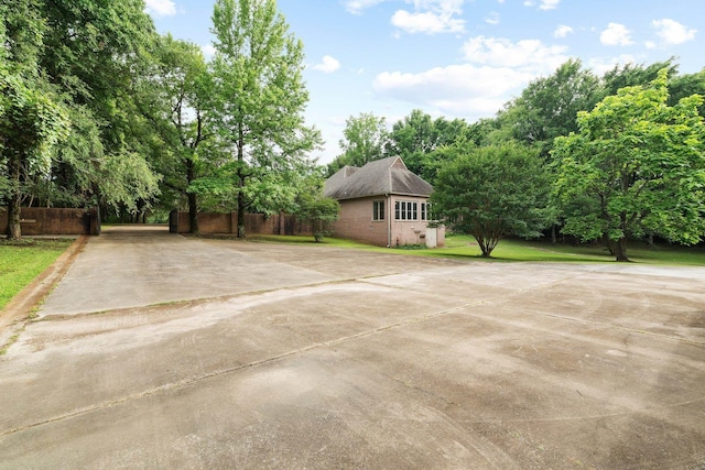 6500 State Line Rd, Tn, TN 38141 - view of property exterior with brick siding and driveway