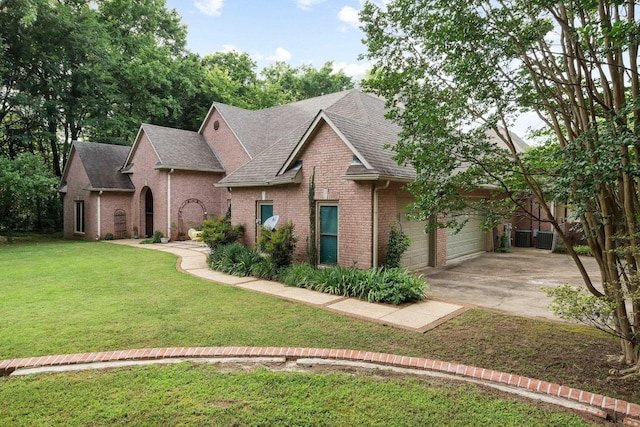 6500 State Line Rd, Tn, TN 38141 - view of front of home with brick siding, driveway, roof with shingles, a front yard, and a garage