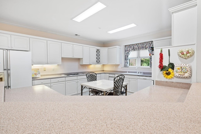 6500 State Line Rd, Tn, TN 38141 - kitchen with white appliances, white cabinets, crown molding, and light countertops