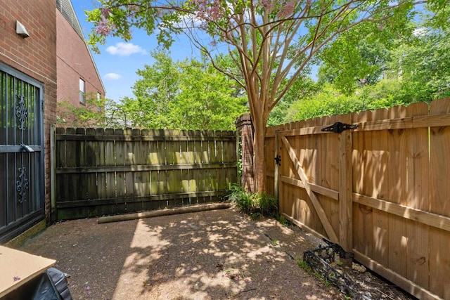 5686 Quince Rd Unit 3, Memphis, TN 38119 - fenced backyard featuring a gate and a patio