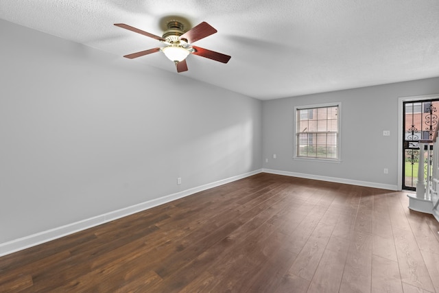 5686 Quince Rd Unit 3, Memphis, TN 38119 - unfurnished room featuring a ceiling fan, dark wood-style flooring, and a textured ceiling