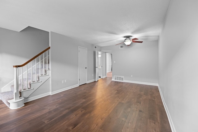 5686 Quince Rd Unit 3, Memphis, TN 38119 - unfurnished living room featuring a ceiling fan, wood-type flooring, and stairway