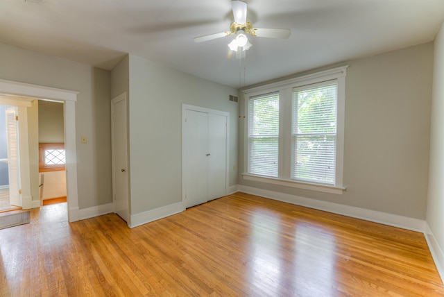 1692 Carruthers Pl, Memphis, TN 38112 - unfurnished bedroom featuring light wood-type flooring and ceiling fan
