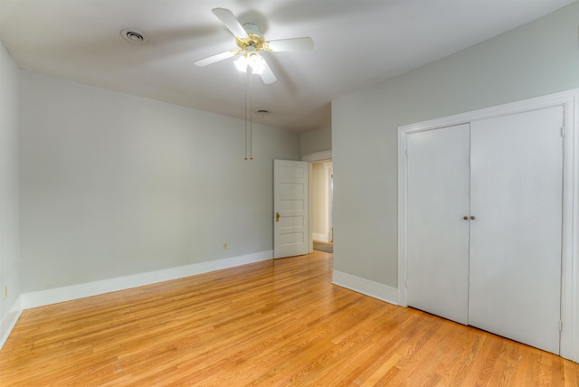 1692 Carruthers Pl, Memphis, TN 38112 - unfurnished bedroom with light wood-style flooring, a closet, and ceiling fan