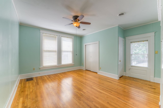 1692 Carruthers Pl, Memphis, TN 38112 - empty room featuring a ceiling fan, ornamental molding, and light wood-type flooring