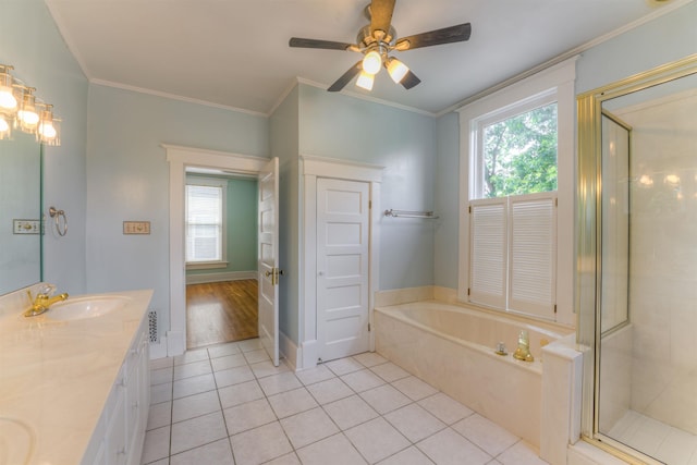 1692 Carruthers Pl, Memphis, TN 38112 - bathroom featuring a bath, plenty of natural light, tile patterned floors, double vanity, and crown molding