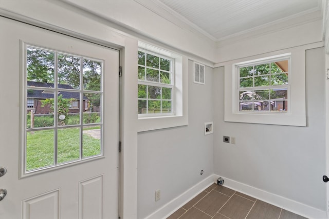 730 Maury St, Memphis, TN 38107 - laundry room featuring electric dryer hookup, ornamental molding, plenty of natural light, and washer hookup