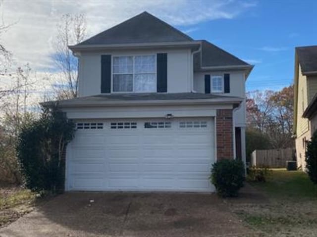 1017 Cordova Ridge Pl, Cordova, TN 38018 - traditional home with a garage and driveway