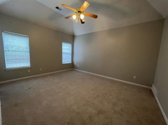 1017 Cordova Ridge Pl, Cordova, TN 38018 - carpeted empty room with a ceiling fan and vaulted ceiling