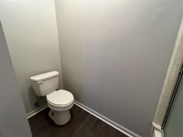 1017 Cordova Ridge Pl, Cordova, TN 38018 - bathroom featuring wood finished floors and a shower with door