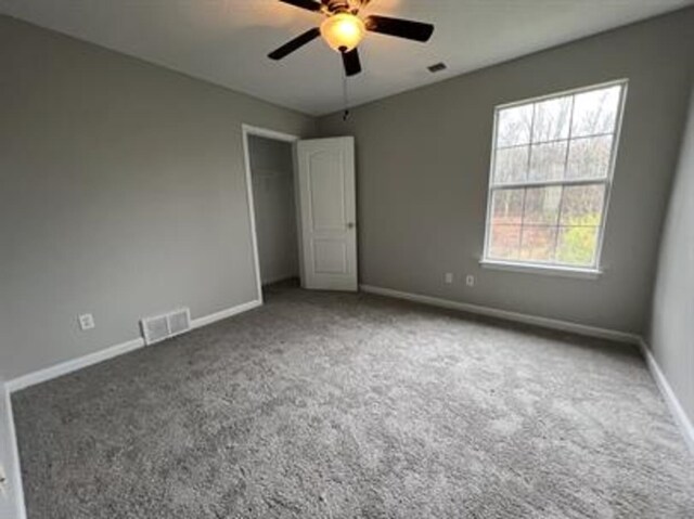 1017 Cordova Ridge Pl, Cordova, TN 38018 - unfurnished bedroom with carpet flooring and ceiling fan