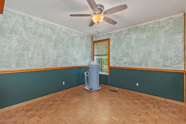 18 County Road 252nd Rd, Glen, MS 38846 - empty room with wallpapered walls, a textured ceiling, and ceiling fan