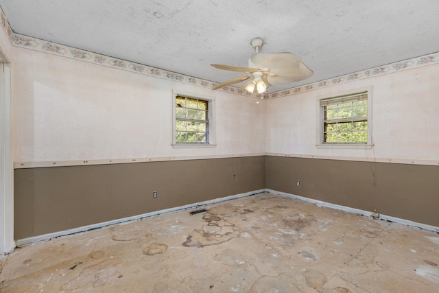 18 County Road 252nd Rd, Glen, MS 38846 - unfurnished room featuring plenty of natural light, a textured ceiling, and a ceiling fan