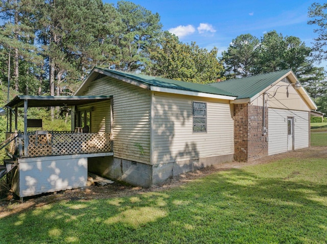 18 County Road 252nd Rd, Glen, MS 38846 - view of home's exterior with crawl space, a yard, and a metal roof
