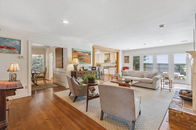 215 Belhaven St, Memphis, TN 38117 - living room featuring crown molding, wood finished floors, and recessed lighting