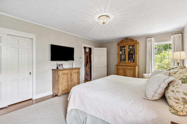 215 Belhaven St, Memphis, TN 38117 - bedroom featuring crown molding and wood finished floors